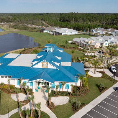 Aerial view of Latitude Watersound sales center building and parking lot