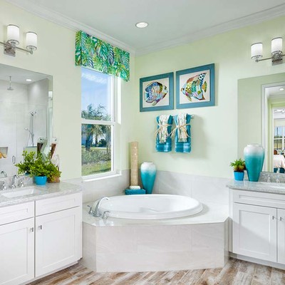 Bathroom with bathtub and side tables Bathroom with bathtub and side tables