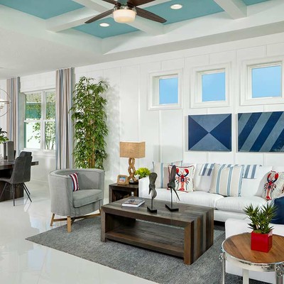 White large living room with sofa and two armchairs White large living room with sofa and two armchairs