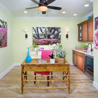 Room with a large table and chair