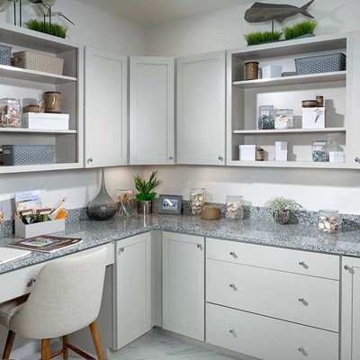 A hobby room with a large table and chair A hobby room with a large table and chair