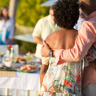 Man hugging a woman on the street