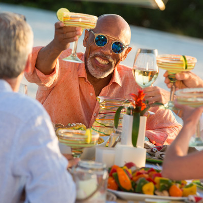 A group of people at the table on the street