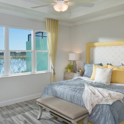 Bedroom with king size bed and large window Bedroom with king size bed and large window