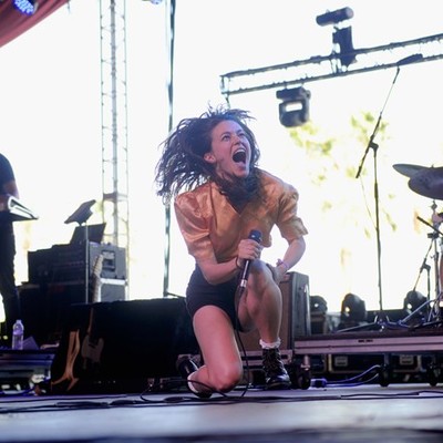 Meg Myers onstage singing at Coachella 