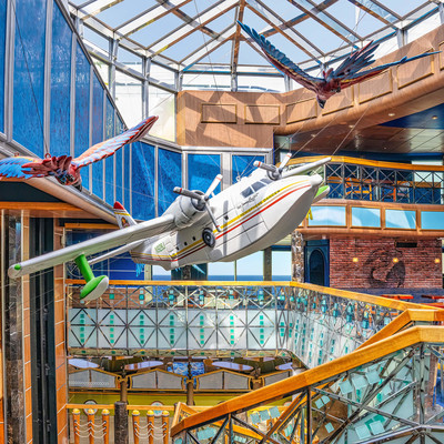 Inside of Islander ship with large water plane hanging from ceiling