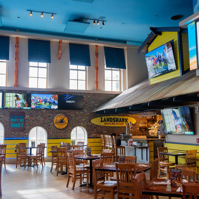 Inside of Landshark with various tables and bar