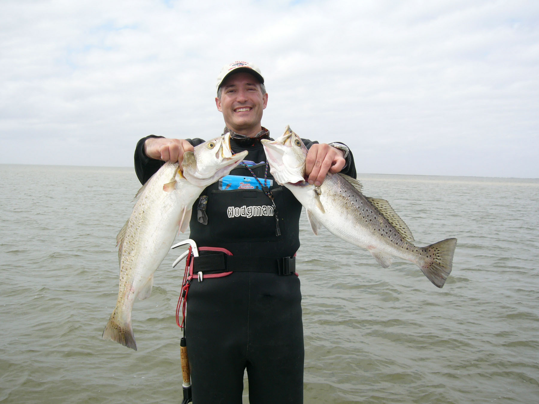 Brian and James Smaistrla, Mike Carter, and Capt. Bill fished at the Matagorda Harbor 02.19.07. Fish Talk: April 2007