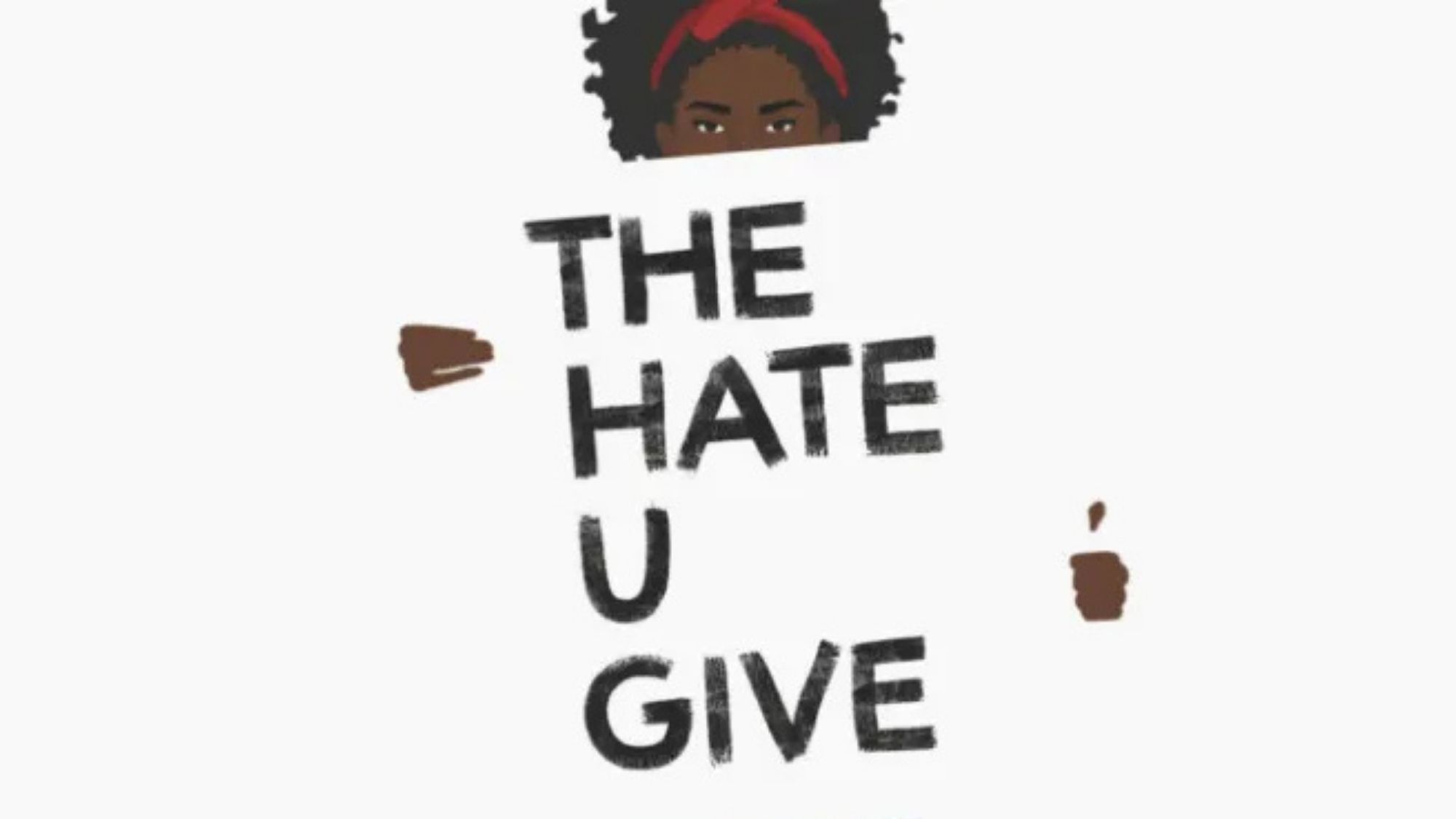 Picture of a Black teenage girl holding the words 
