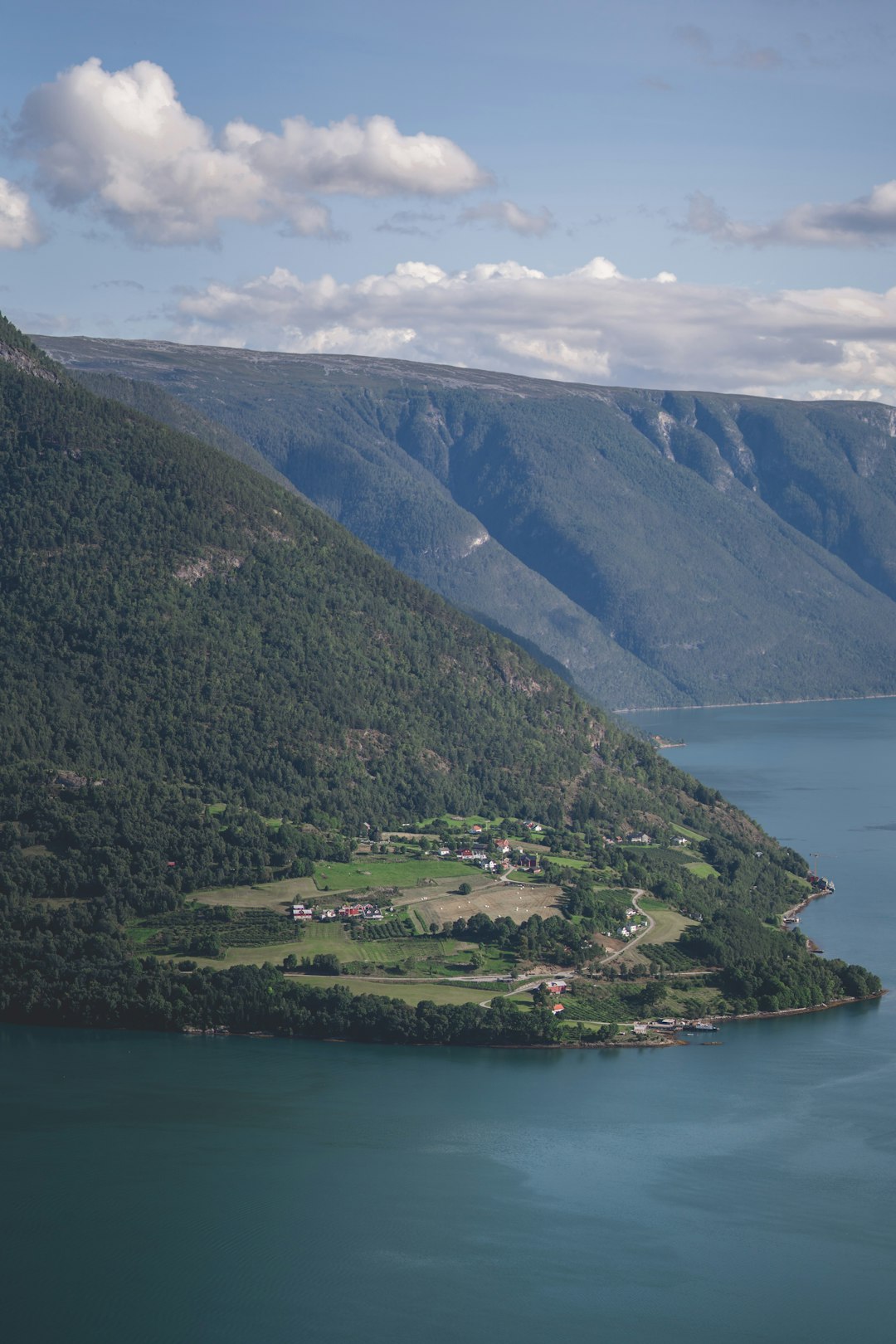 What are the prospective benefits and disadvantages of selling Alaska land?