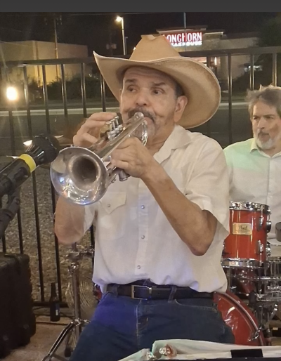 Louie Ramirez Sr. Blowing that Horn