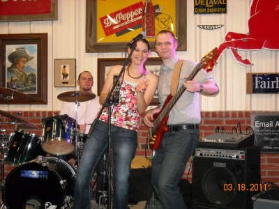 <p>Ashley "The Blue Note Babe" On stage with her Fiance' Keeping the boys on track with her tamborine ! </p>