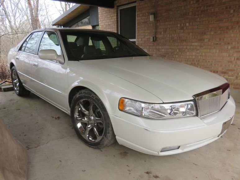 Image for 2005 NISSAN 350Z and 2003 CADILLAC SEVILLE SLS