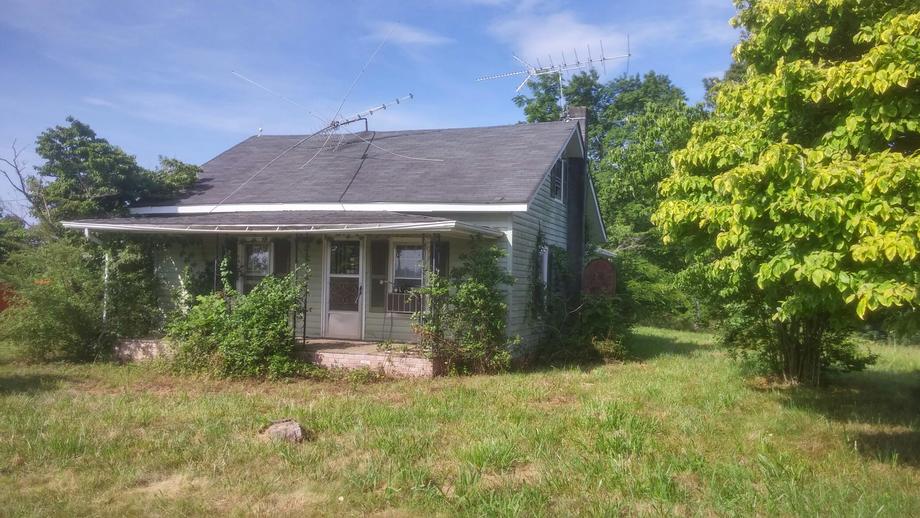 House with Buildings on 0.85 Acres in State Road, NC Commissioner's Sale