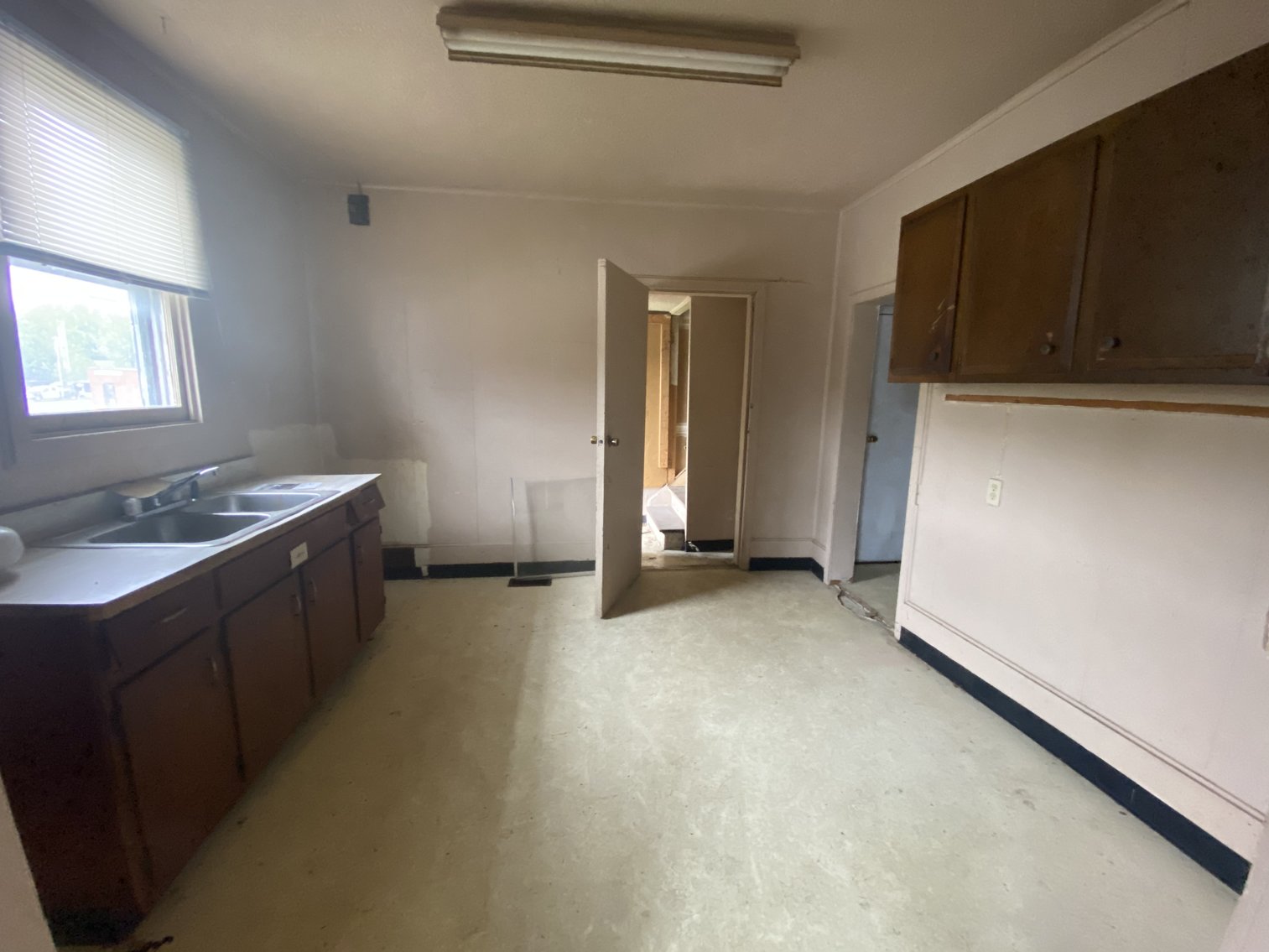 Home on Corner Lot with Multiple Garages