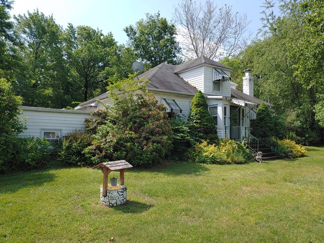 2 STORY VINYL SIDED 3 BR, 2 BATH HOME, 2 PARCELS, ZONED R-2, 2.24+/- ACRES PLUS REMAINING PERSONAL PROPERTY