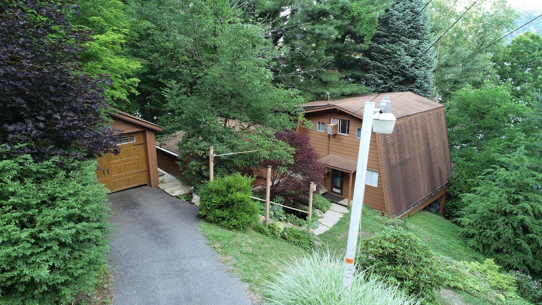 Chalet on Cheat Lake Sold to the Highest Bidder