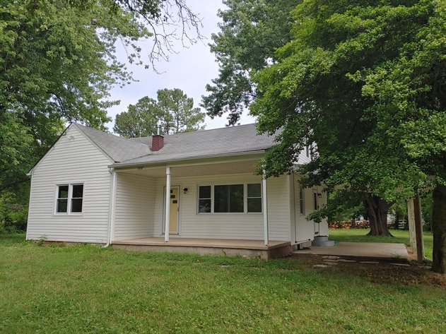 4 BR, 2 BA, UPDATED 2 STORY VINYL SIDED HOME W/ COVERED CARPORT ON .54+/- ACRE LOT