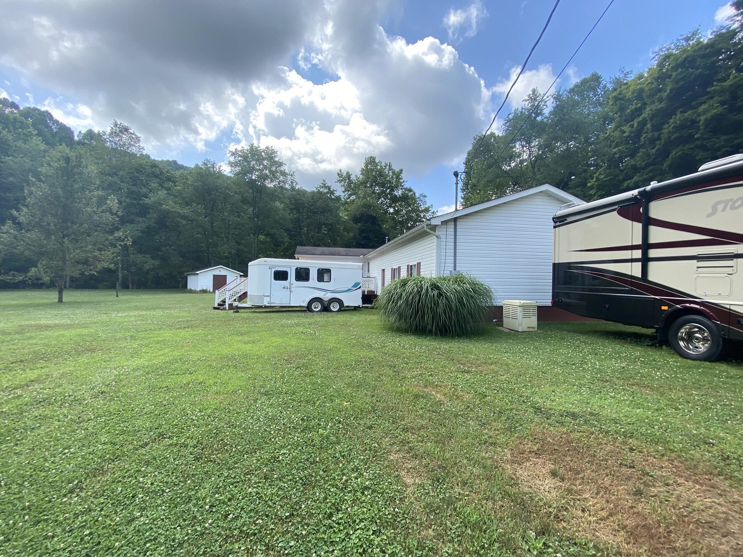 Image for SOLD $150,700 - Ranch Home on 2.6 Acres, Fleetwood Storm RV, John Deere Gator, & more
