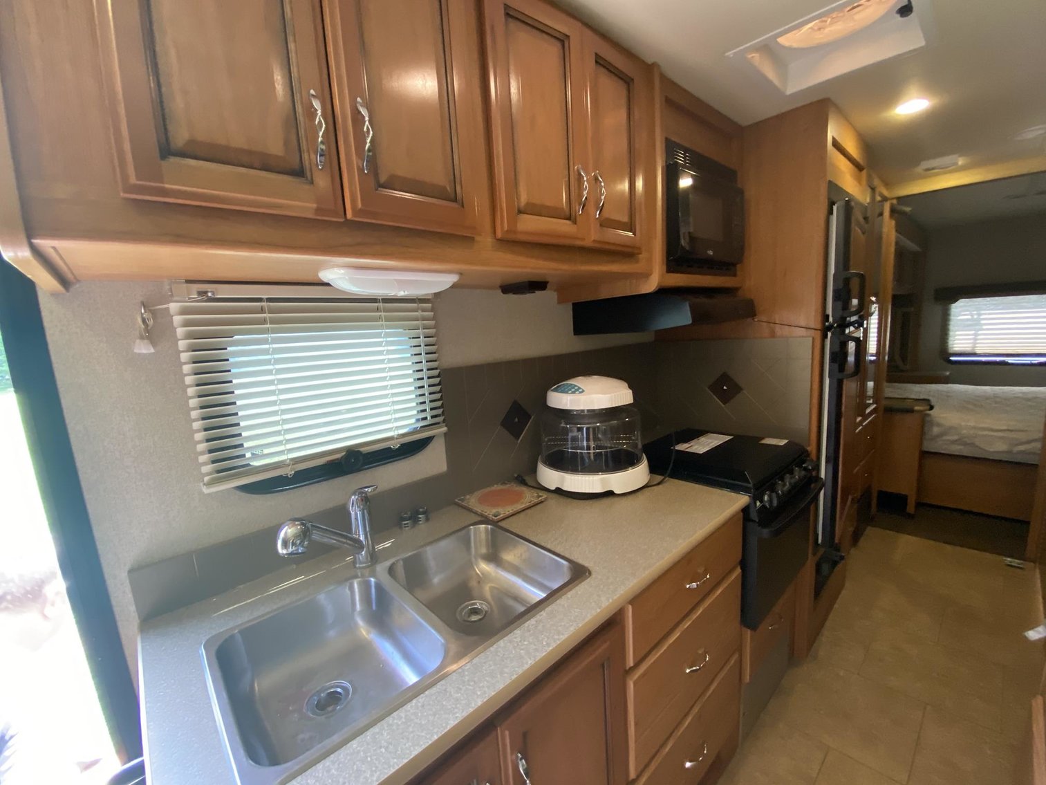 Image for SOLD $150,700 - Ranch Home on 2.6 Acres, Fleetwood Storm RV, John Deere Gator, & more