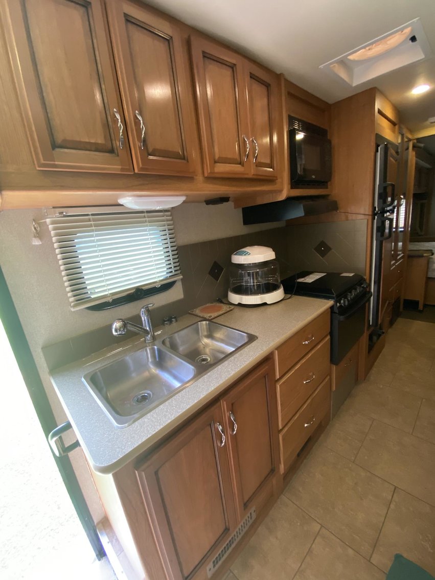 Image for SOLD $150,700 - Ranch Home on 2.6 Acres, Fleetwood Storm RV, John Deere Gator, & more