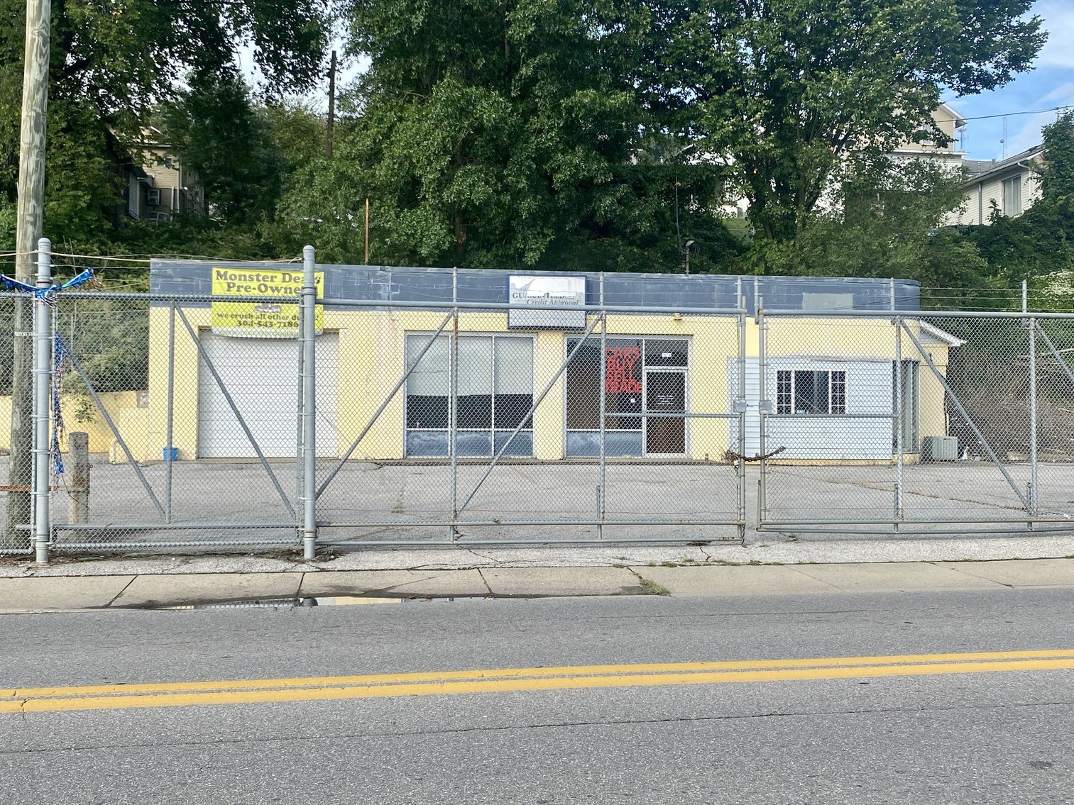 Fenced Commercial Lot Sold to the Highest Bidder
