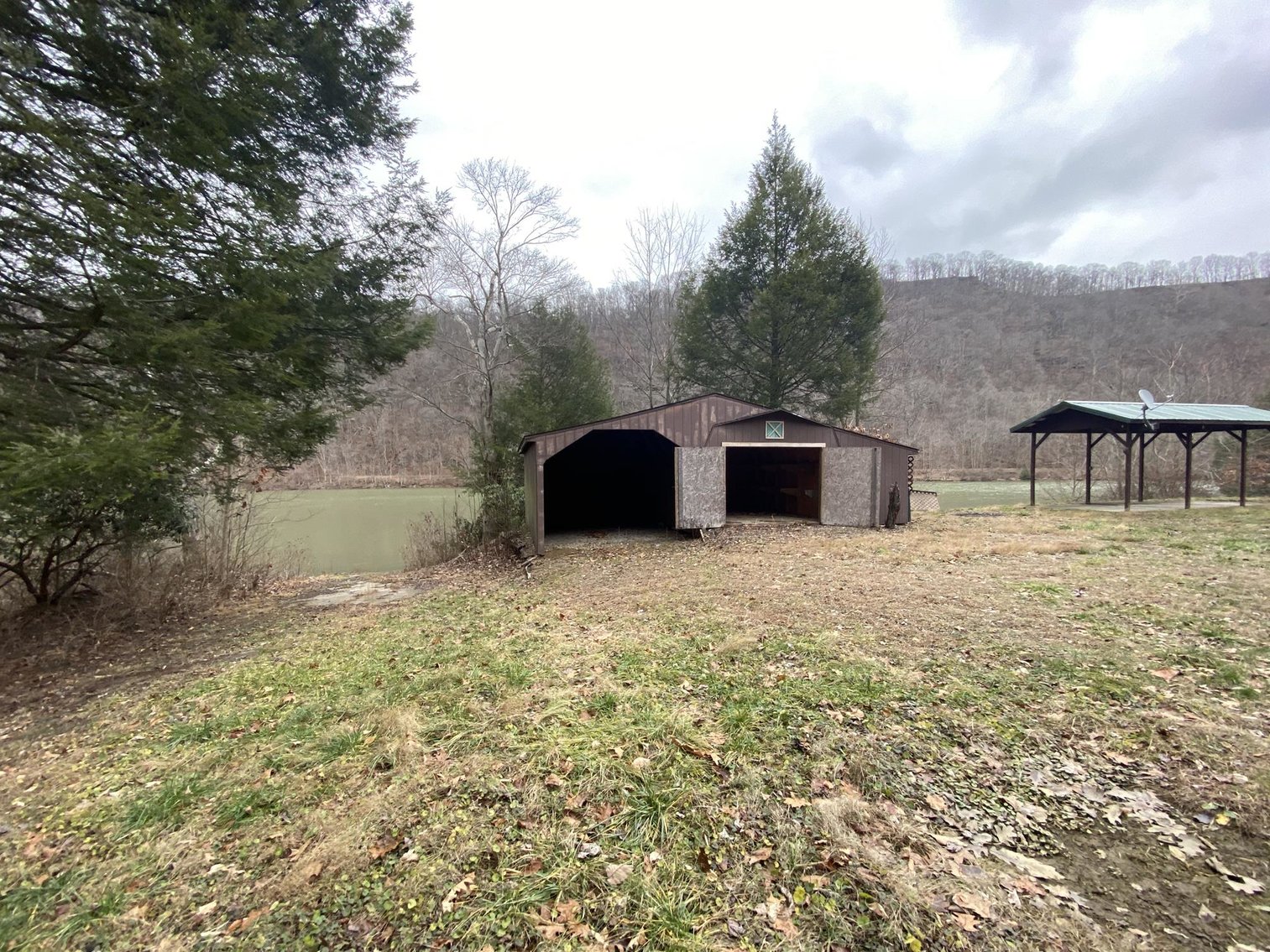 Image for SOLD $161,700 - Riverfront Camp with 3 Bedroom Cabin