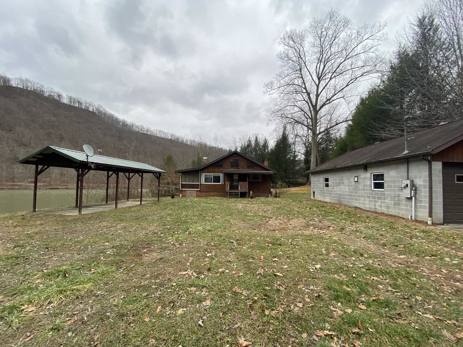 Image for SOLD $161,700 - Riverfront Camp with 3 Bedroom Cabin