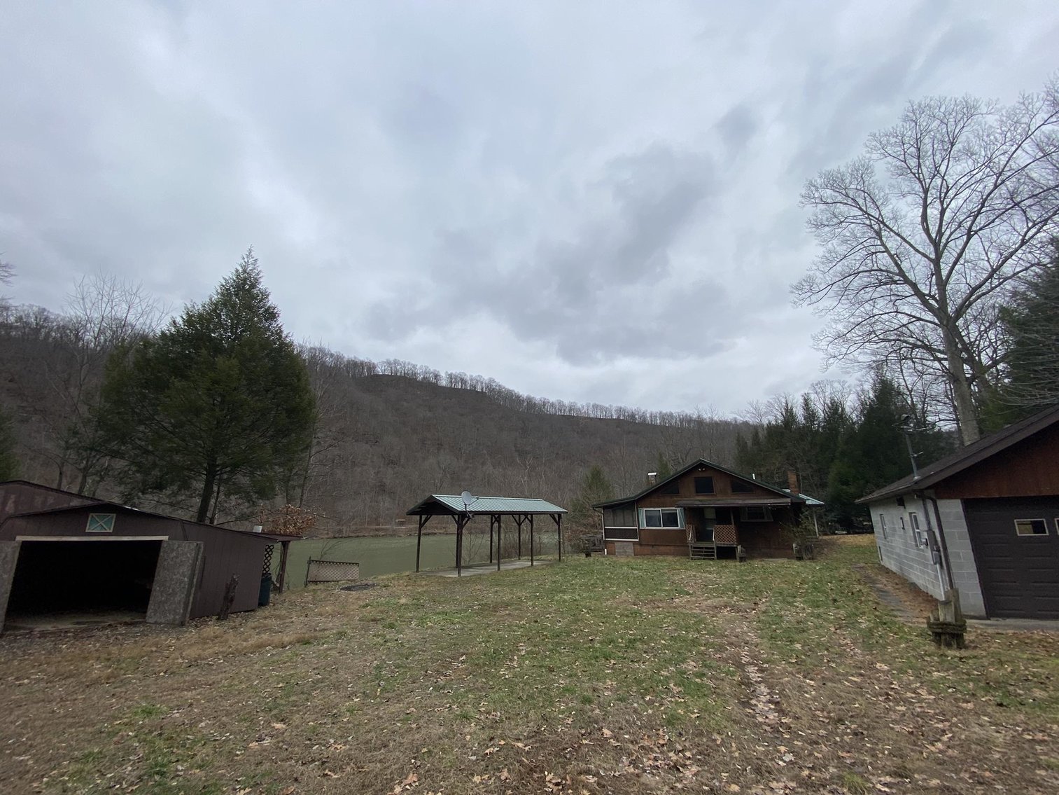 Image for SOLD $161,700 - Riverfront Camp with 3 Bedroom Cabin