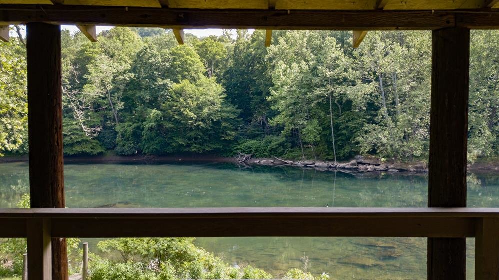 Image for SOLD $280,500 - Tygart Riverfront Camp on 4 Acres