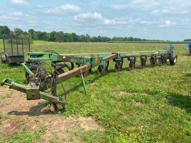 Surplus Farm Equipment, JD Plows, Gravity Box, Baler and More