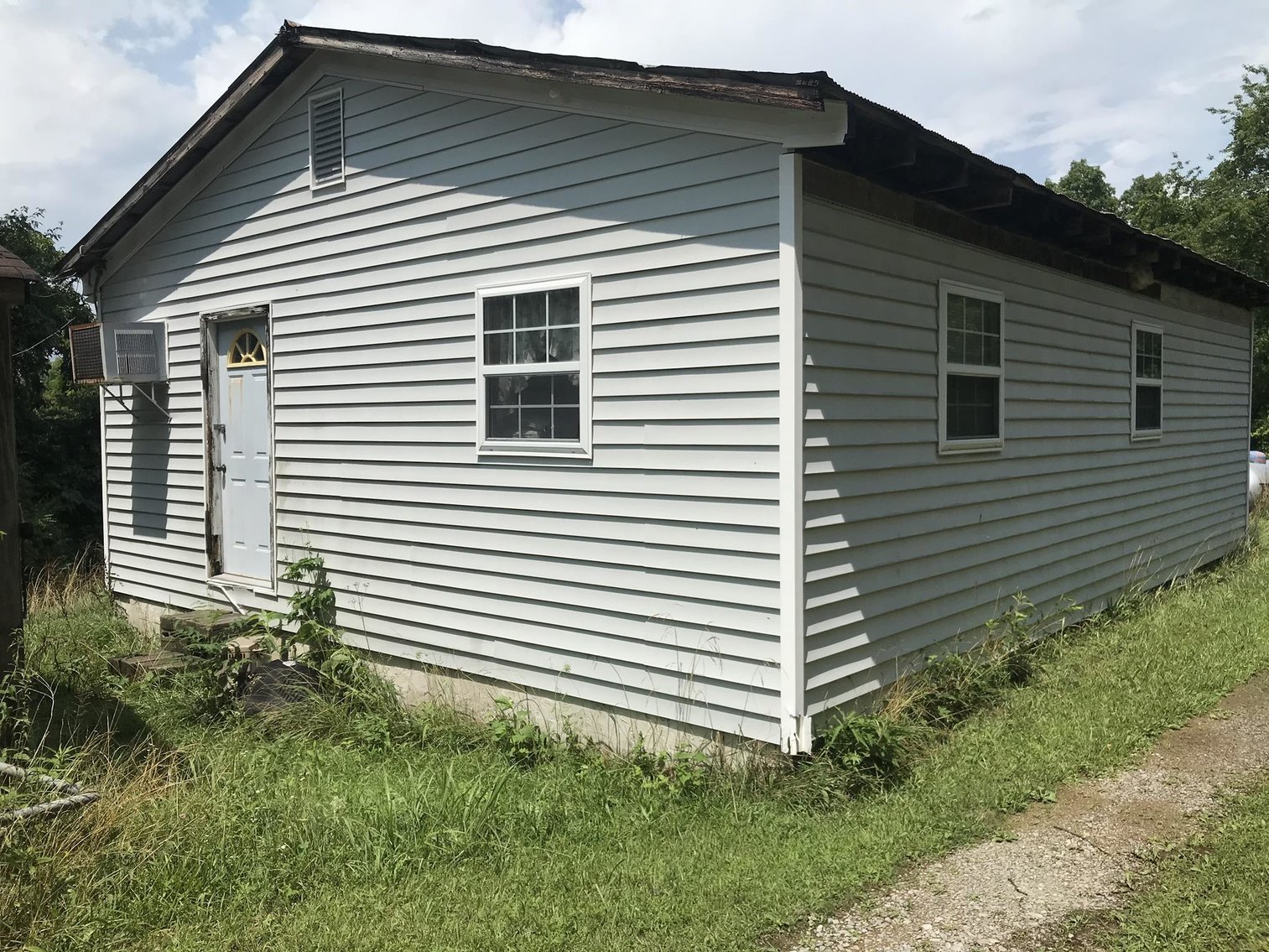 3 Homes & Salvage Yard on 56 Acres Selling to the Highest Bidder