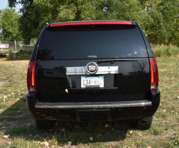 2007 Cadillac Escalade & 2001 Ford Focus