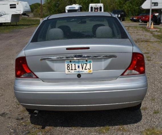 2007 Cadillac Escalade & 2001 Ford Focus