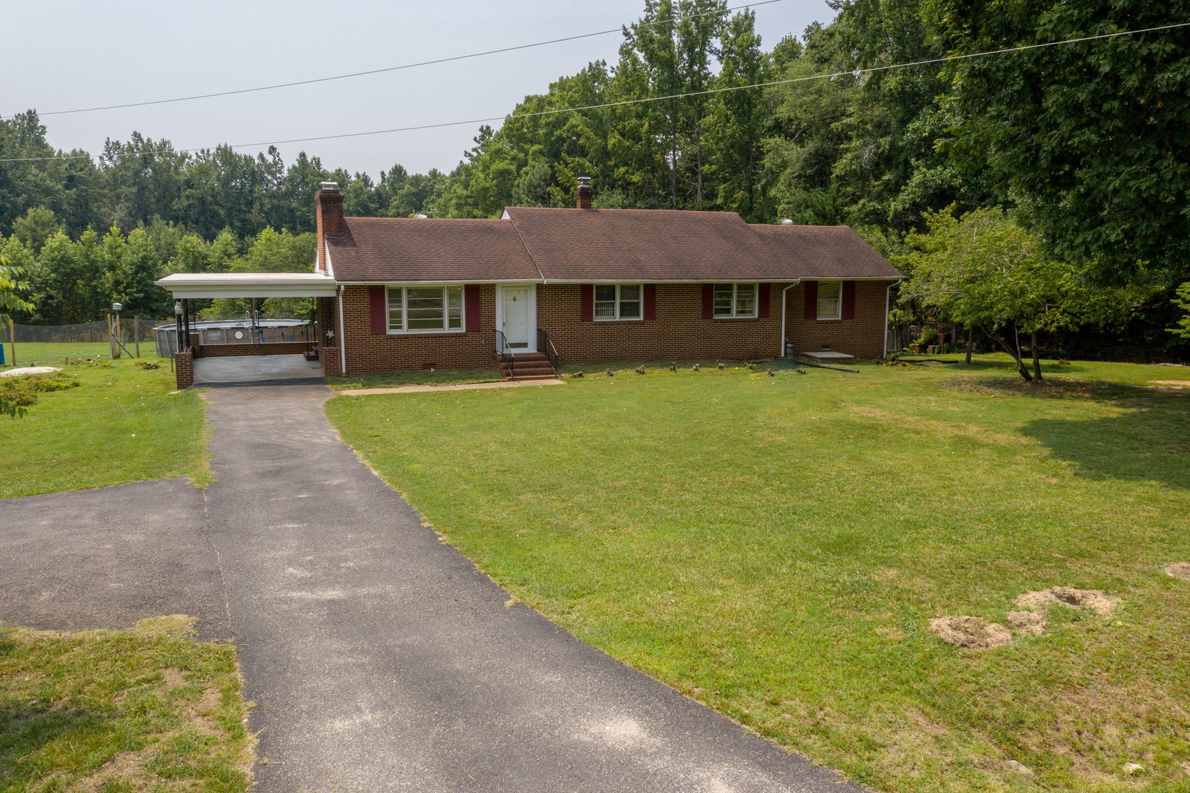 Image for 3 BR/2 BA Brick Rancher Situated on 20± Acres With a Pond - 1,740 SQFT - 4317 Grubby Rd, Wilsons, VA 23894
