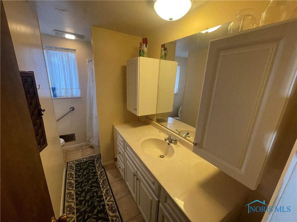 Image for MINIMUM BID AUCTION $99,000! 4704 Sutton Pl