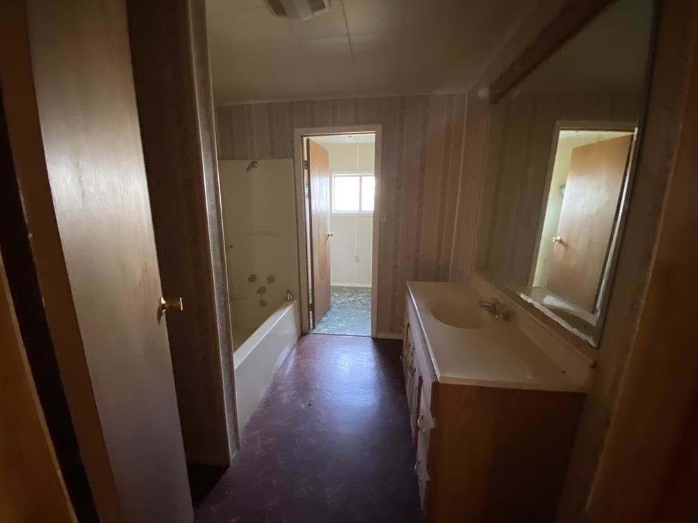 Image for SOLD $26,125 - Riverfront Home Selling to the Highest Bidder