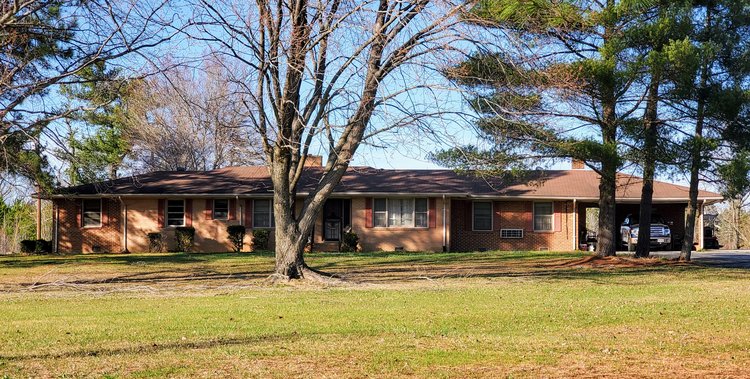 Image for SALE CANCELED DUE TO BANKRUPTCY FILING | Trustee Sale | 3 bedroom | 3 bath | 2,236 +/- sf | Brick Rancher on 23.96 +/- acres on Hwy. 58 in Brunswick County, VA