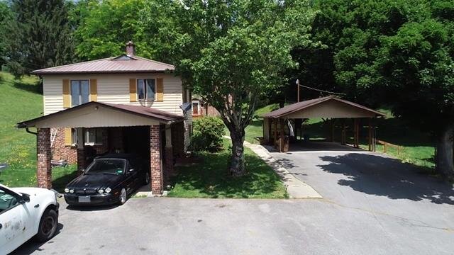 Image for SOLD $277,750 - Two Homes and Commercial Building in Beckley Selling to The Highest Bidder