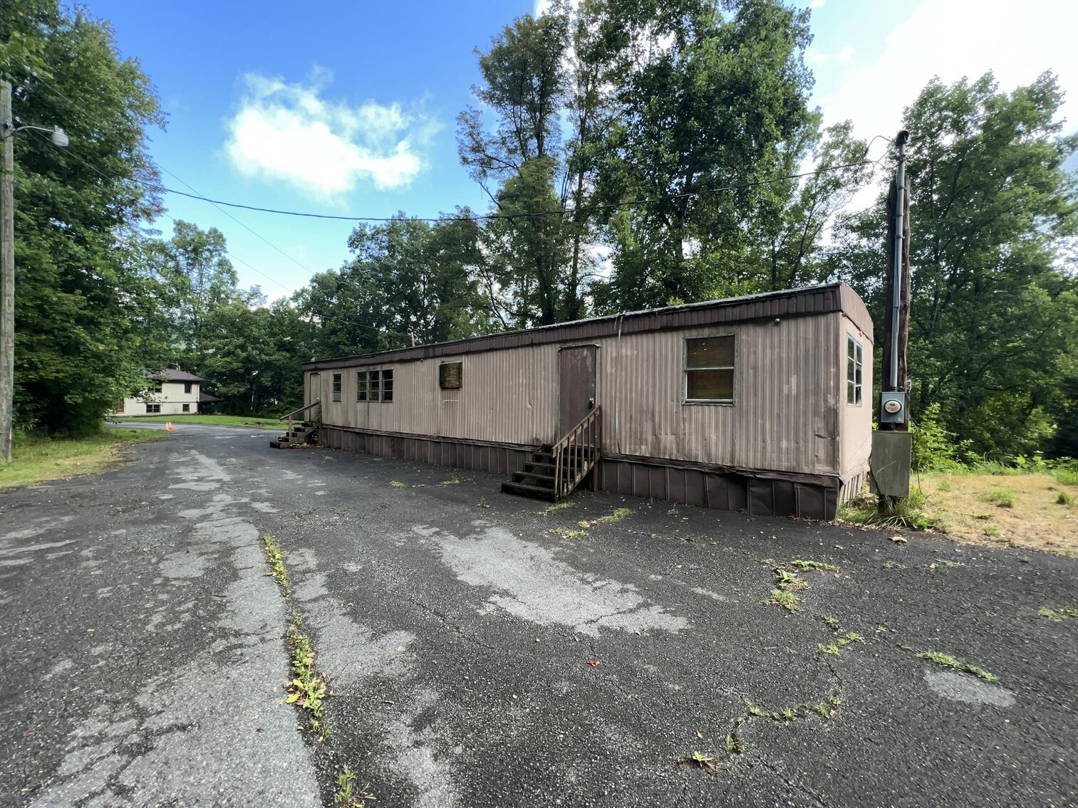Image for SOLD $132,000 - Home, 2 Mobile Homes, & Garage Selling to the Highest Bidder
