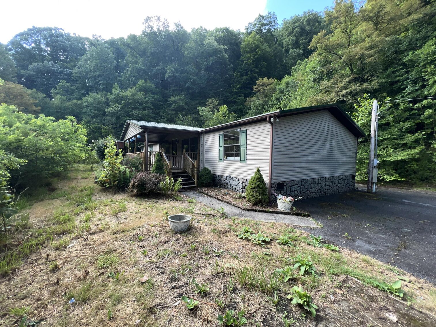 Image for SOLD $132,000 - Home, 2 Mobile Homes, & Garage Selling to the Highest Bidder