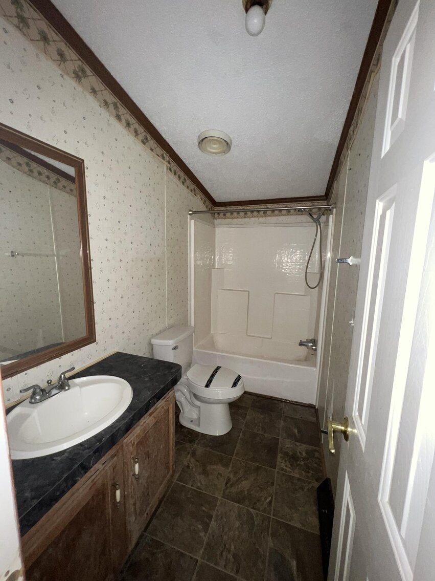 Image for SOLD $132,000 - Home, 2 Mobile Homes, & Garage Selling to the Highest Bidder