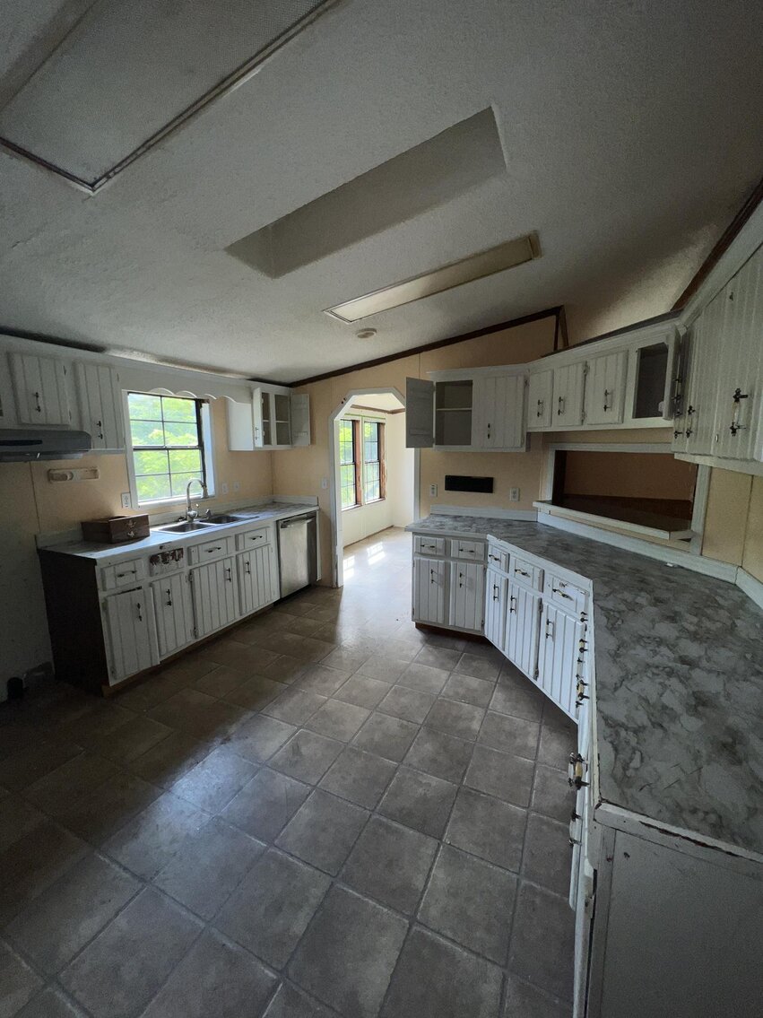 Image for SOLD $132,000 - Home, 2 Mobile Homes, & Garage Selling to the Highest Bidder