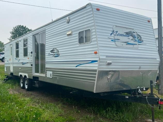 21 Campers: (8) 5th Wheel & (13) Travel Trailers