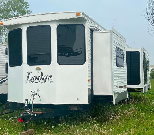 21 Campers: (8) 5th Wheel & (13) Travel Trailers