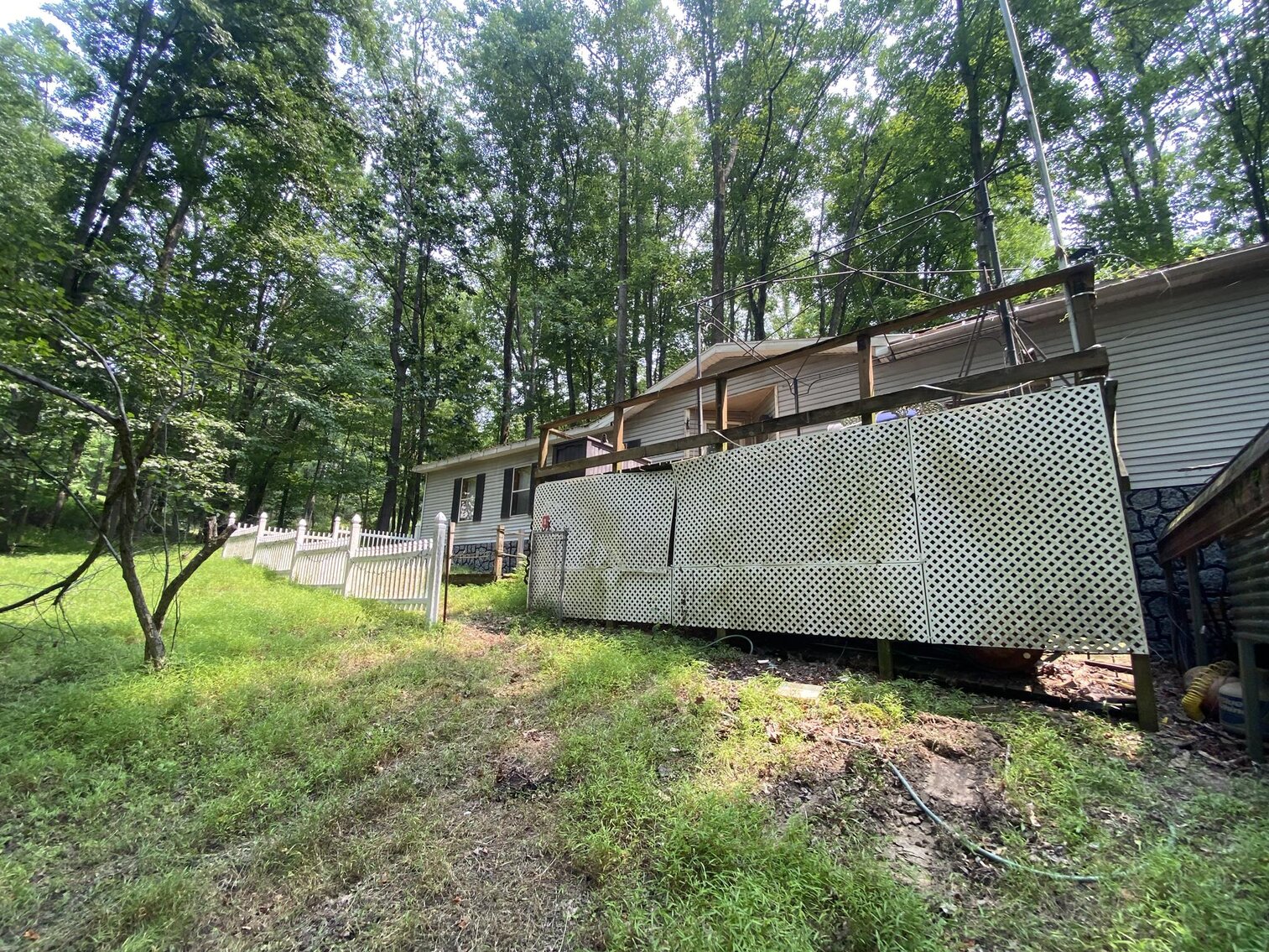 Image for SOLD $151,250 - 2.5 Wooded Acres with Mobile Home Selling to the Highest Bidder