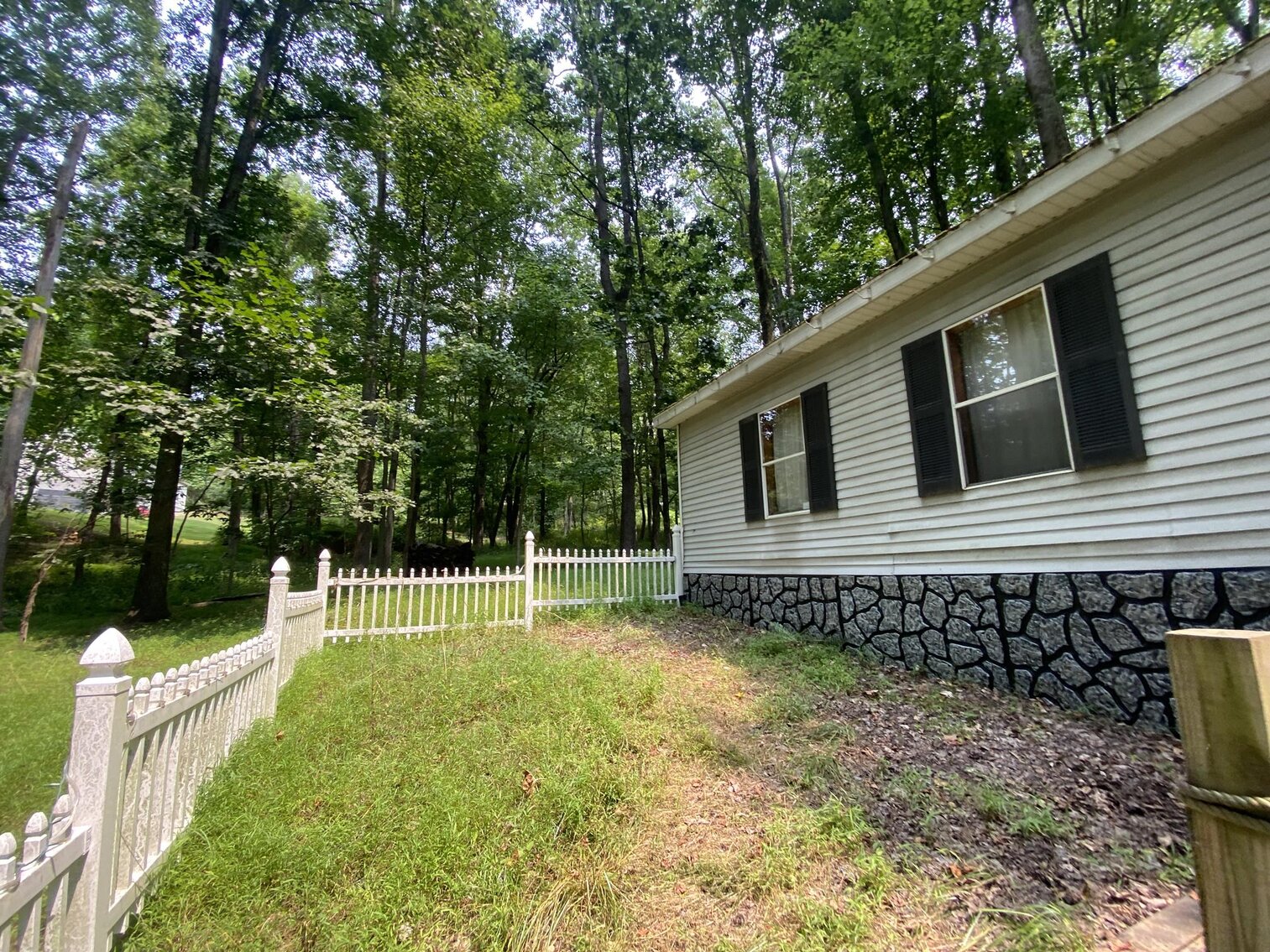 Image for SOLD $151,250 - 2.5 Wooded Acres with Mobile Home Selling to the Highest Bidder