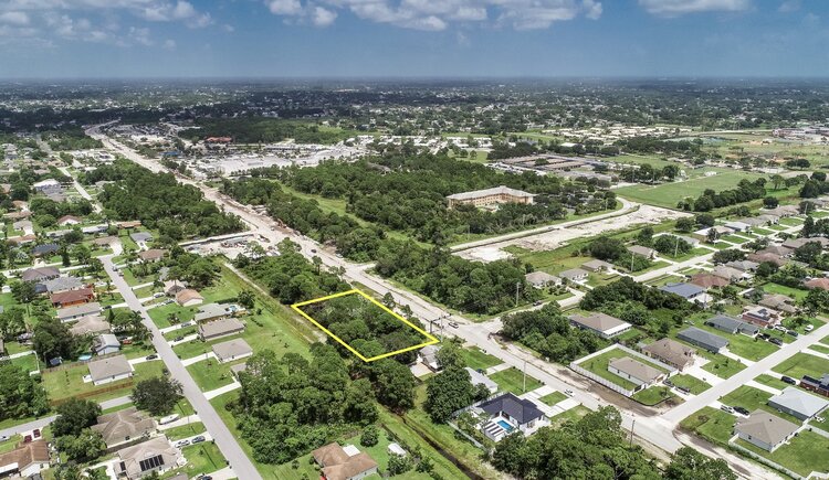 Image for For Sale ONLY at AUCTION .70+/- Acres Directly on Port St. Lucie Boulevard!