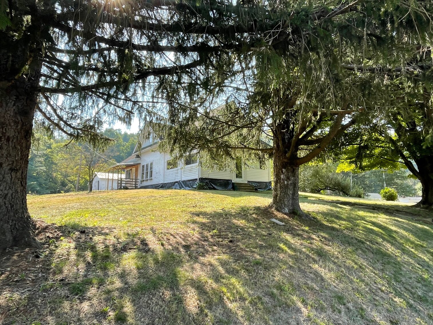 SOLD 51,700 3 Bedroom Farmhouse with Multiple Outbuildings in Lesage