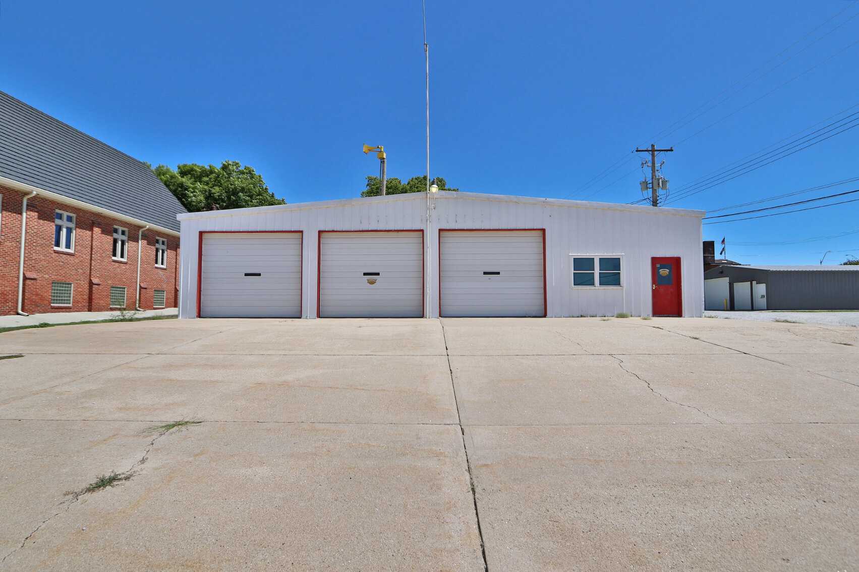 Image for Absolute Pawnee City Firehall Real Estate Auction by the Schaardt Auction Team with Burrows Tracts Real Estate